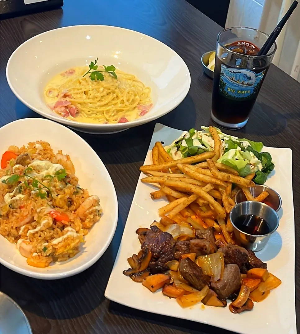 Three Western dishes served with an ocean view