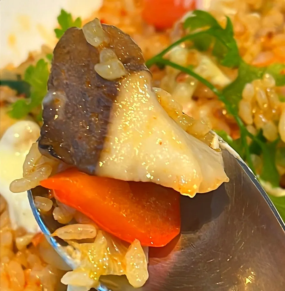 Pilaf with mushrooms, vegetables, and shrimp
