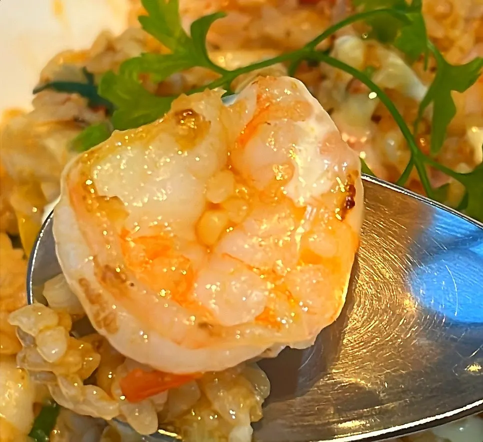 Pilaf with mushrooms, vegetables, and shrimp