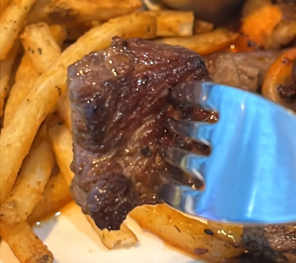 Beef chop steak cut into large pieces