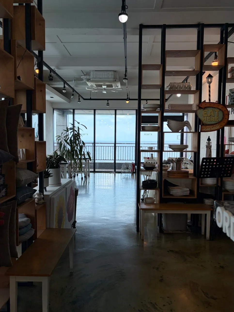 Interior of Plan A Restaurant with the ocean view visible