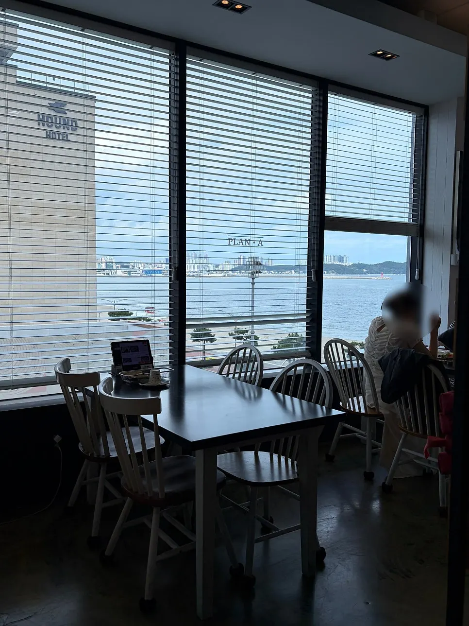 Table at Plan A Restaurant with an open view of the sea