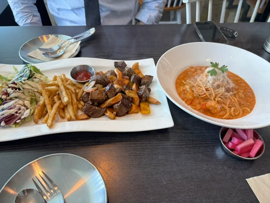 Chop steak plate served with side dishes