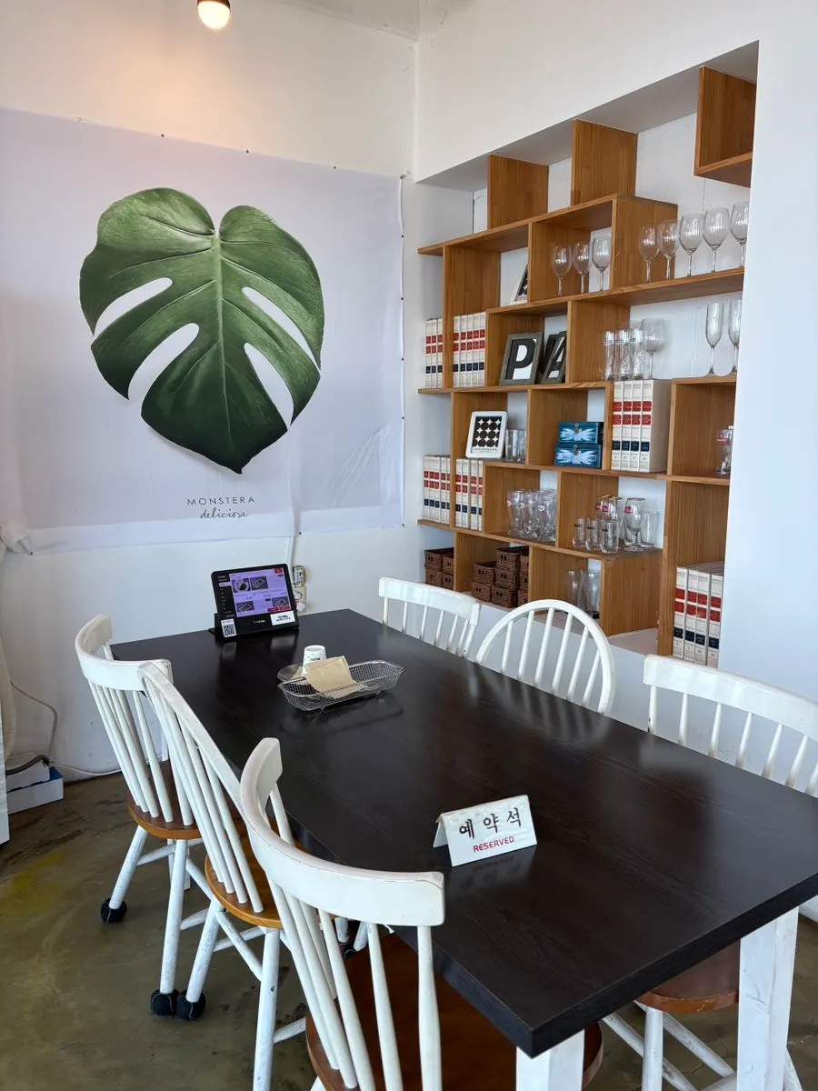 Modern white-and-wood interior of the restaurant