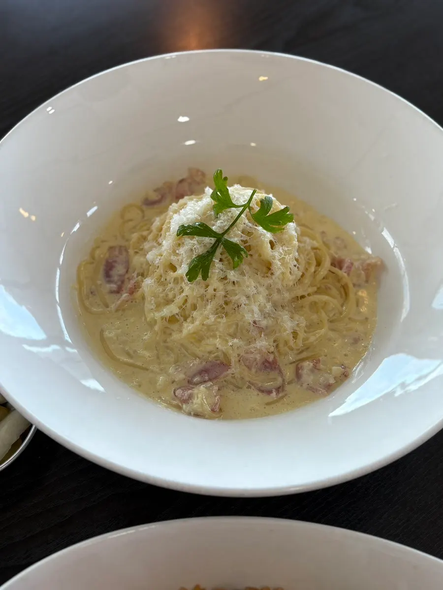 A plate of rich, creamy carbonara spaghetti