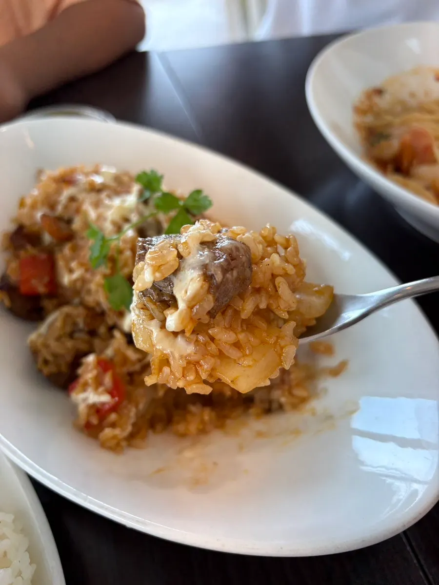 A spoonful of beef pilaf