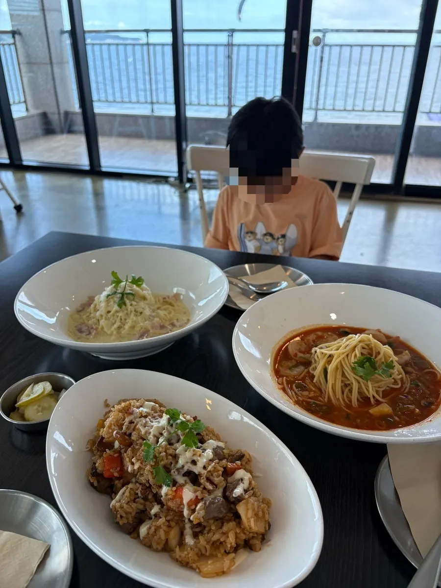 Pasta and pilaf laid out together on the table