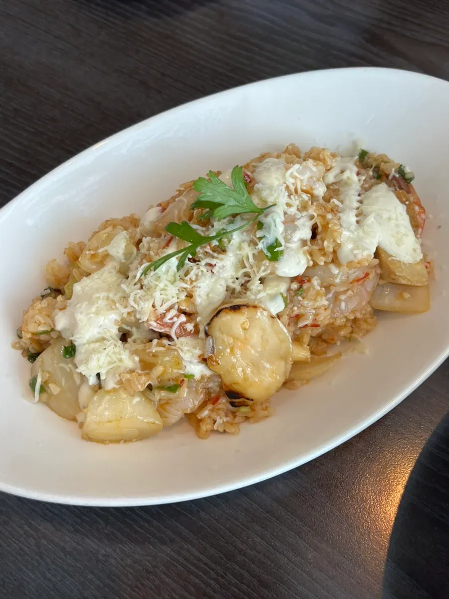 Whole shrimp pilaf at Plan A
