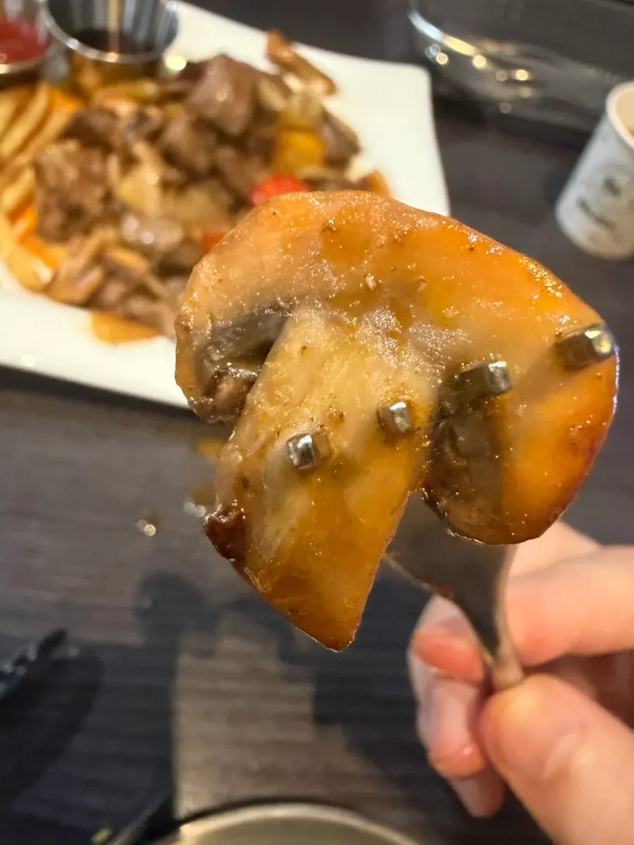 Mushrooms sautéed together with the chop steak