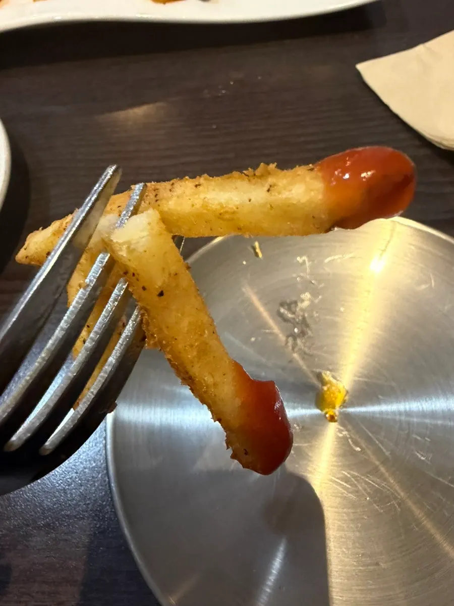 Cajun-style fries served alongside