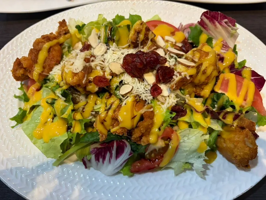 A colorful plate of chicken salad