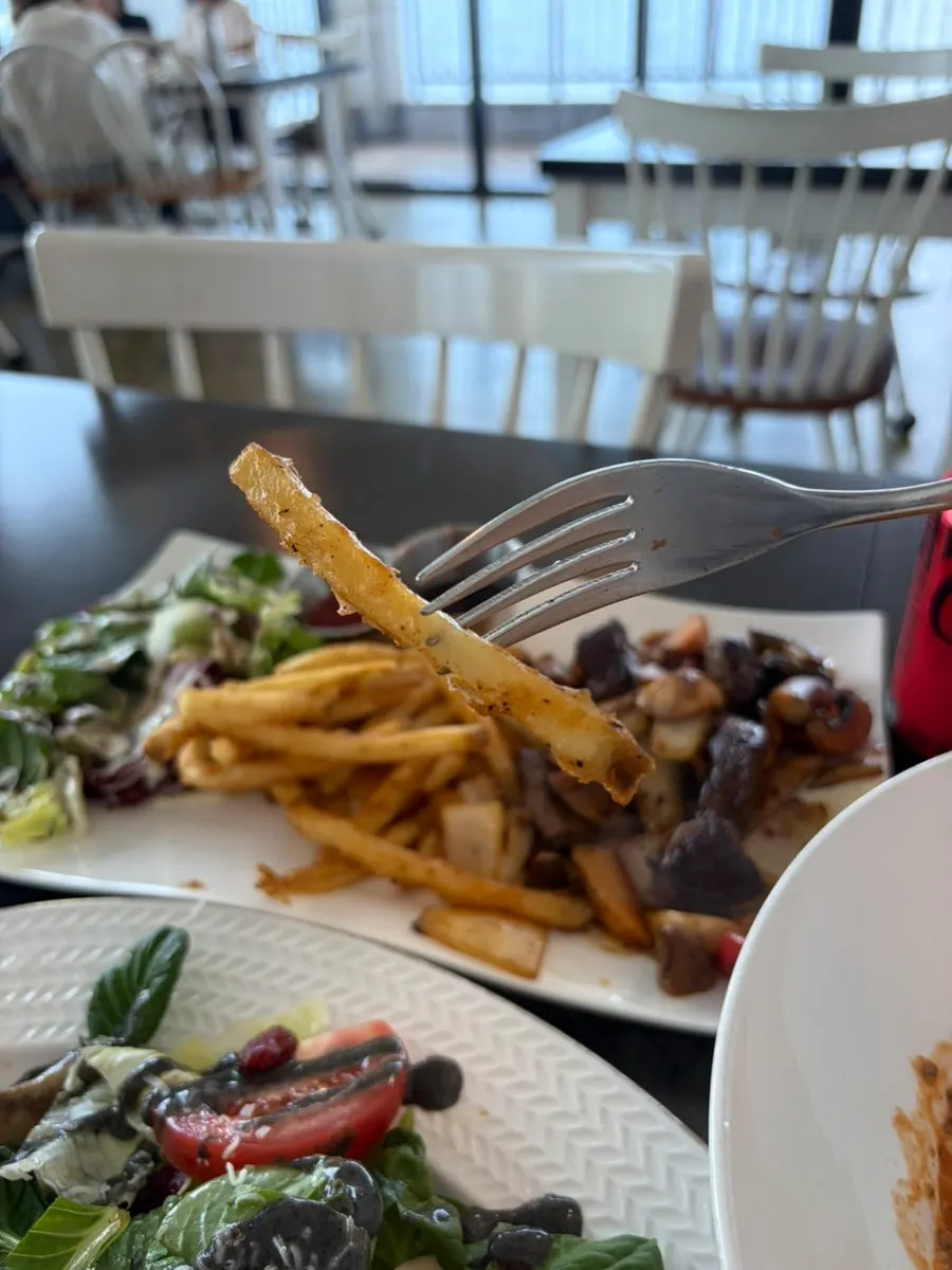 Piece of beef chop steak sautéed with vegetables