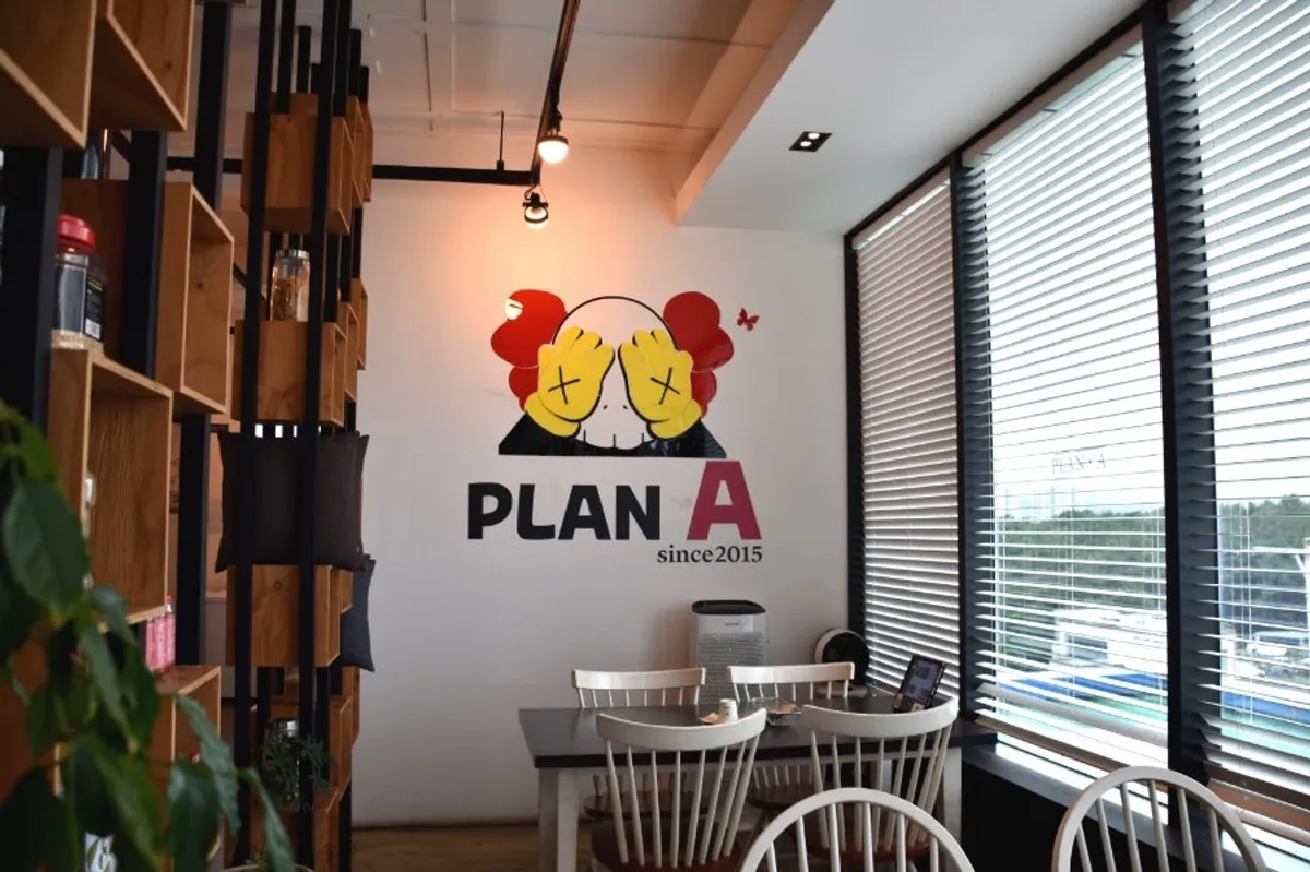 Interior of Plan A Restaurant with a SINCE 2015 sign
