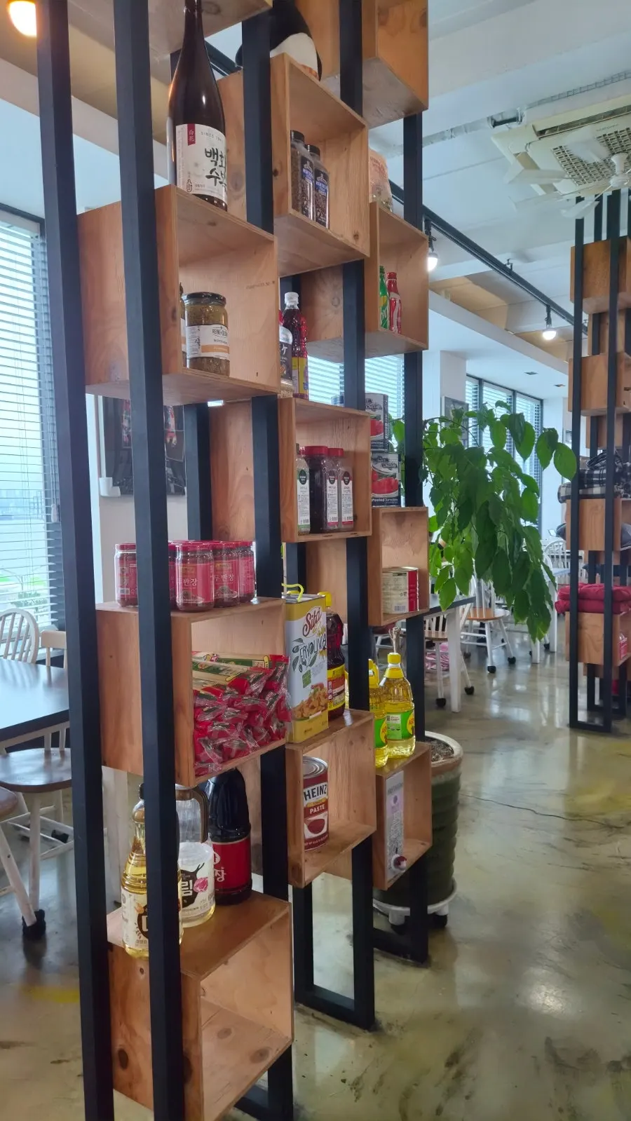 Cozy seating at Plan A Restaurant with plants