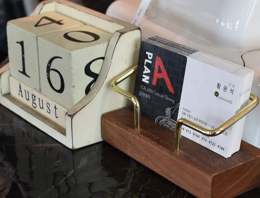 Register area and calendar at Plan A Restaurant