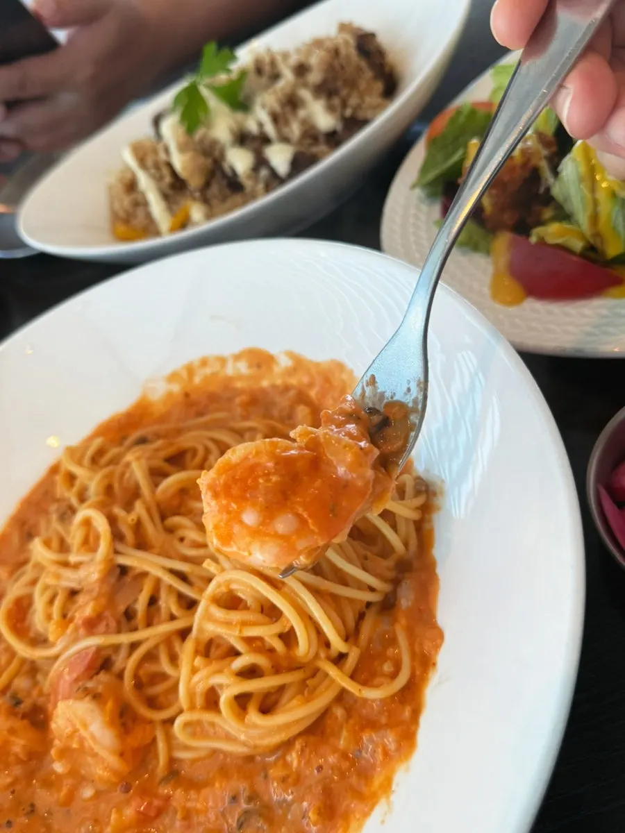 Shrimp rosé pasta twirled around a fork