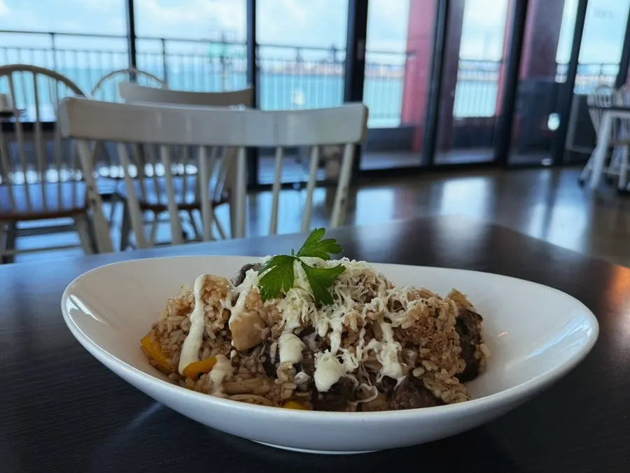 Beef pilaf topped with thick-cut beef