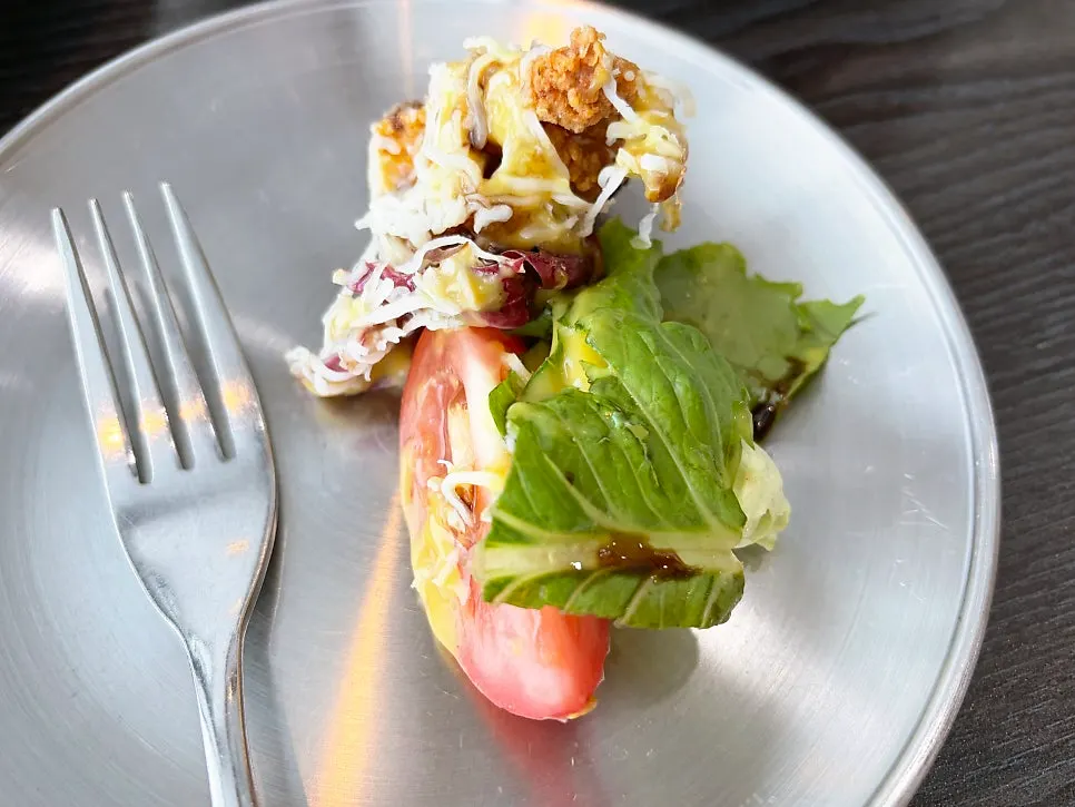 Chicken salad portioned onto a small plate