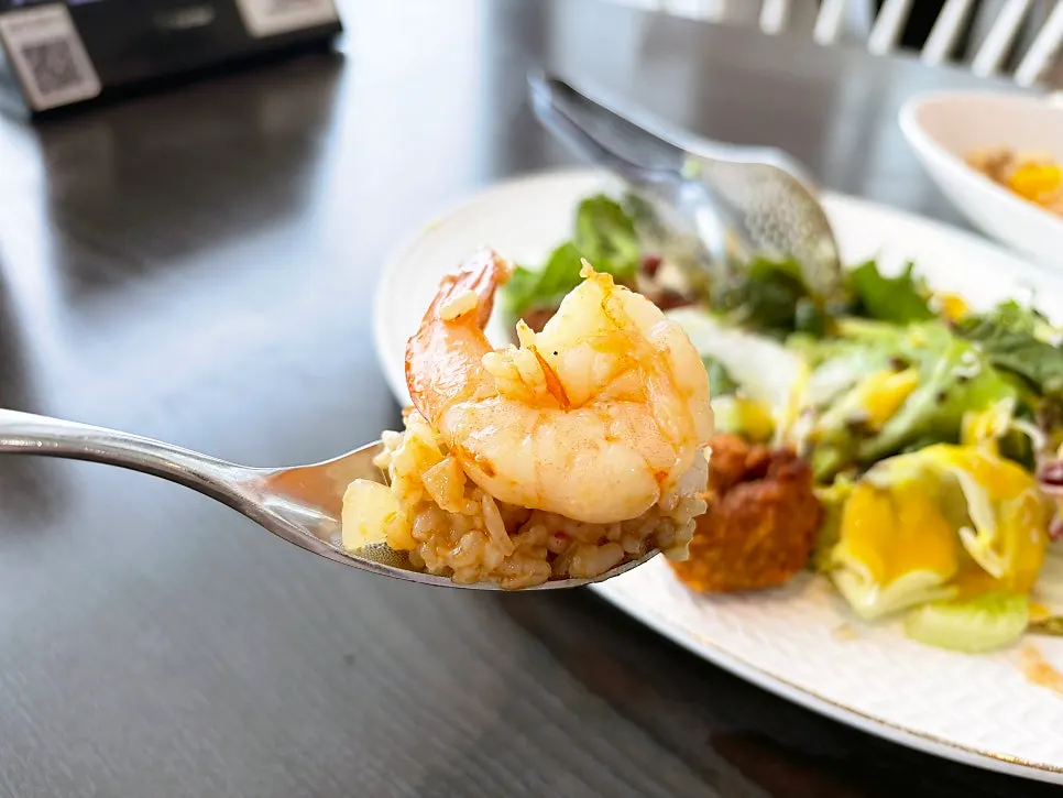 Whole shrimp pilaf topped with large shrimp
