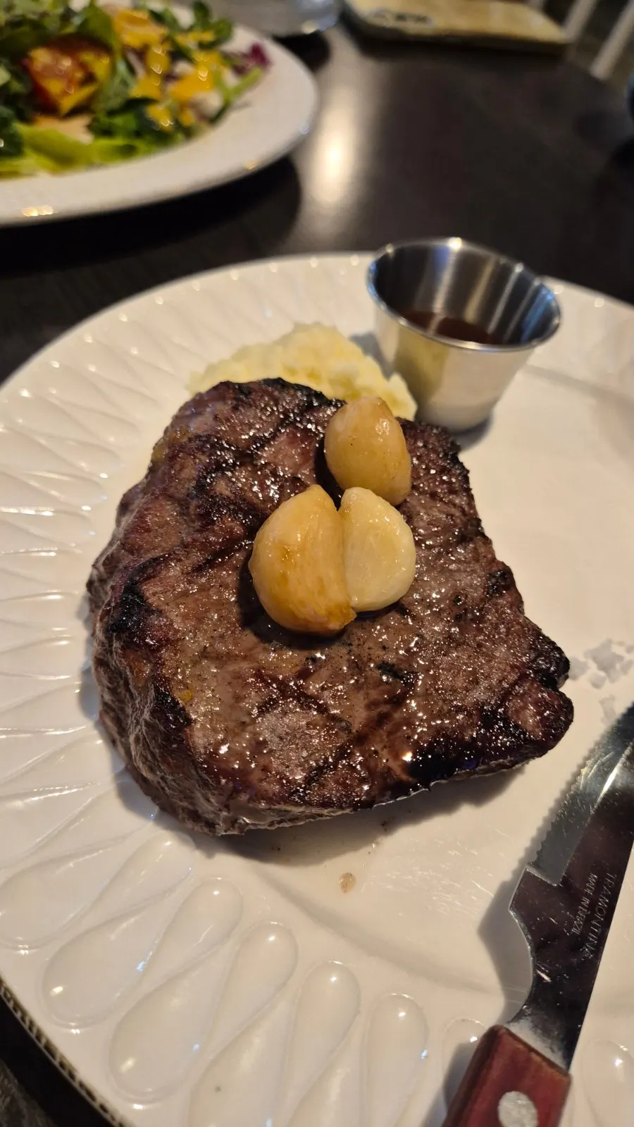 A plate of Plan A Restaurant's sirloin steak