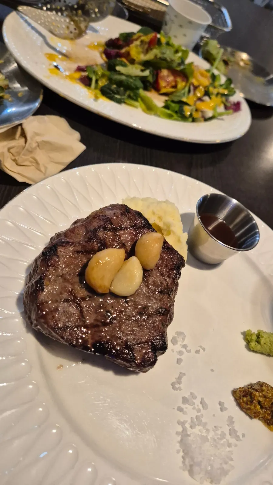 Cross-section of a thick sirloin steak cooked medium-rare