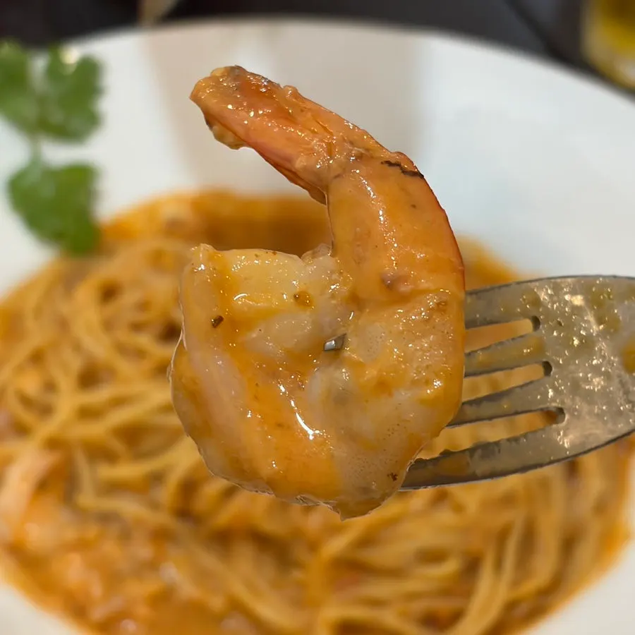 Close-up of noodles coated in rosé sauce