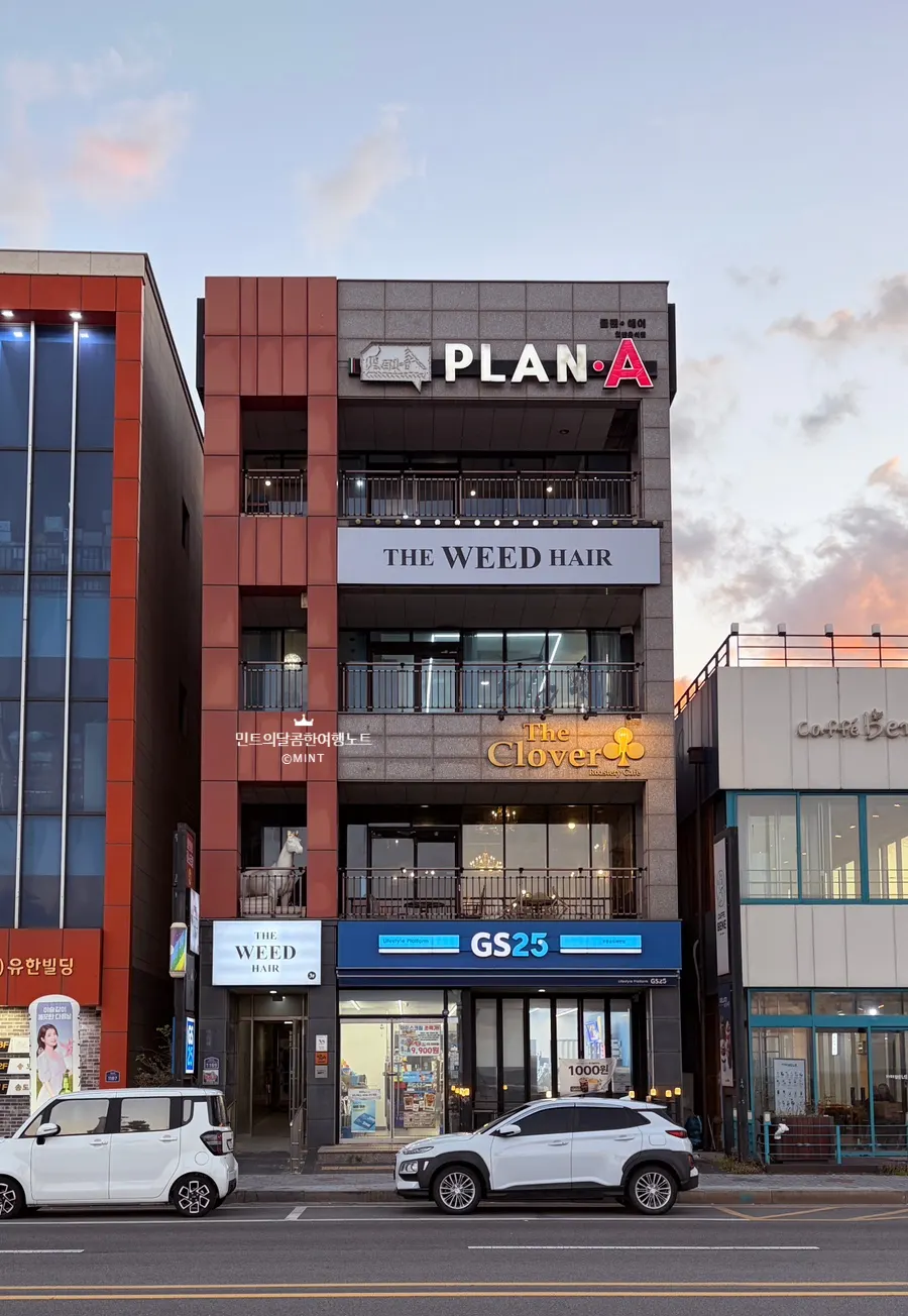 Exterior of the 4-story building housing Plan A Restaurant