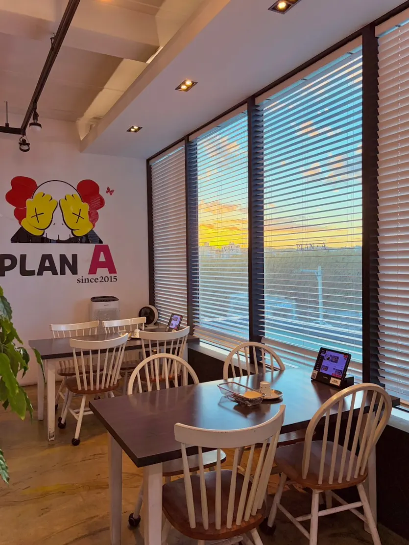 The neatly arranged interior of Plan A Restaurant