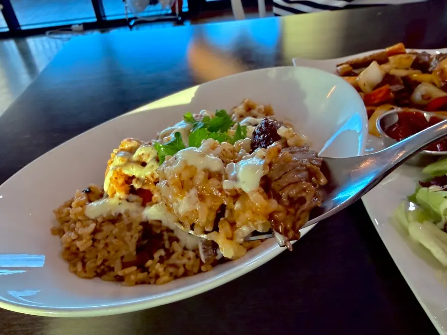 Beef pilaf topped with beef