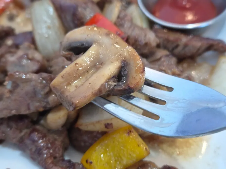 Button mushrooms sautéed in butter