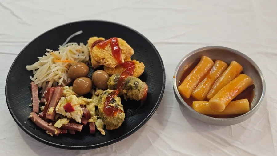 Tteokbokki and fried snacks at the self-serve bar