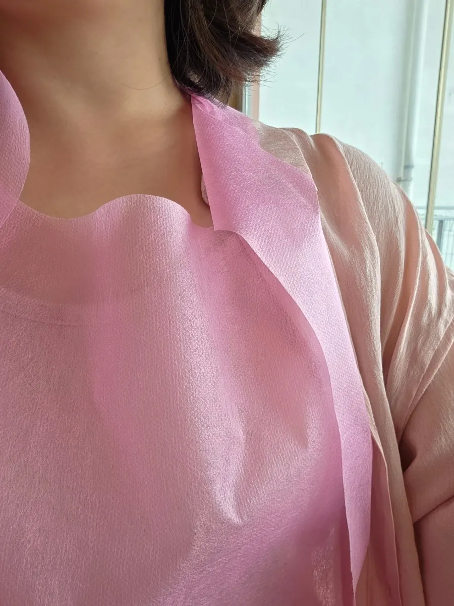 Pink apron while watching baseball