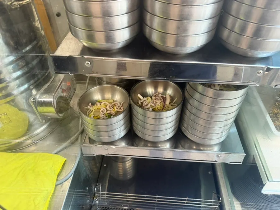 Squid soup scooped from the self bar