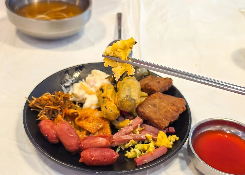 A meal spread filled with self bar side dishes