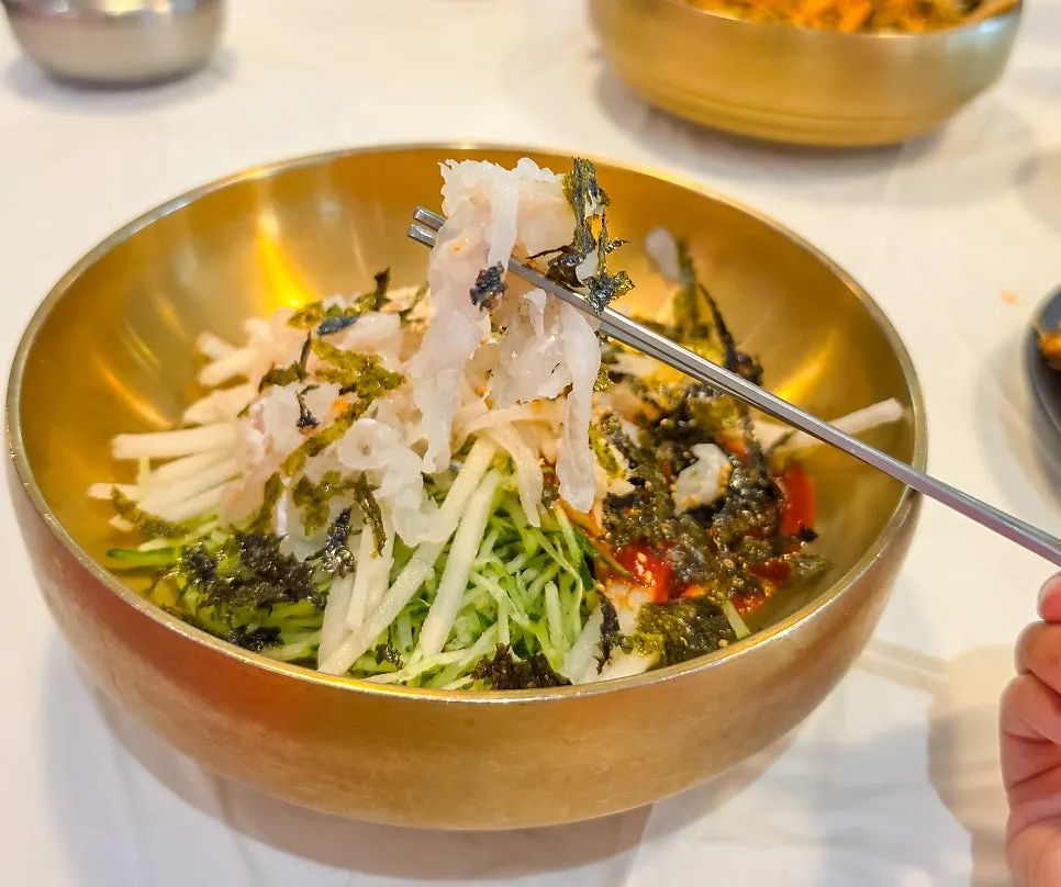 Icy broth poured over half-and-half mulhoe