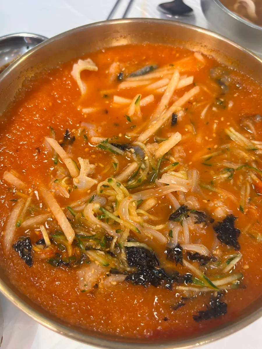 Picking up a piece of pajeon