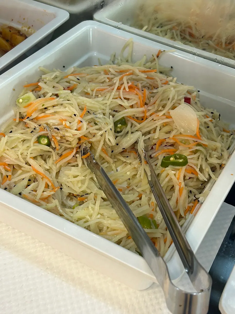 A full spread of side dishes at Ppwang Mulhoe
