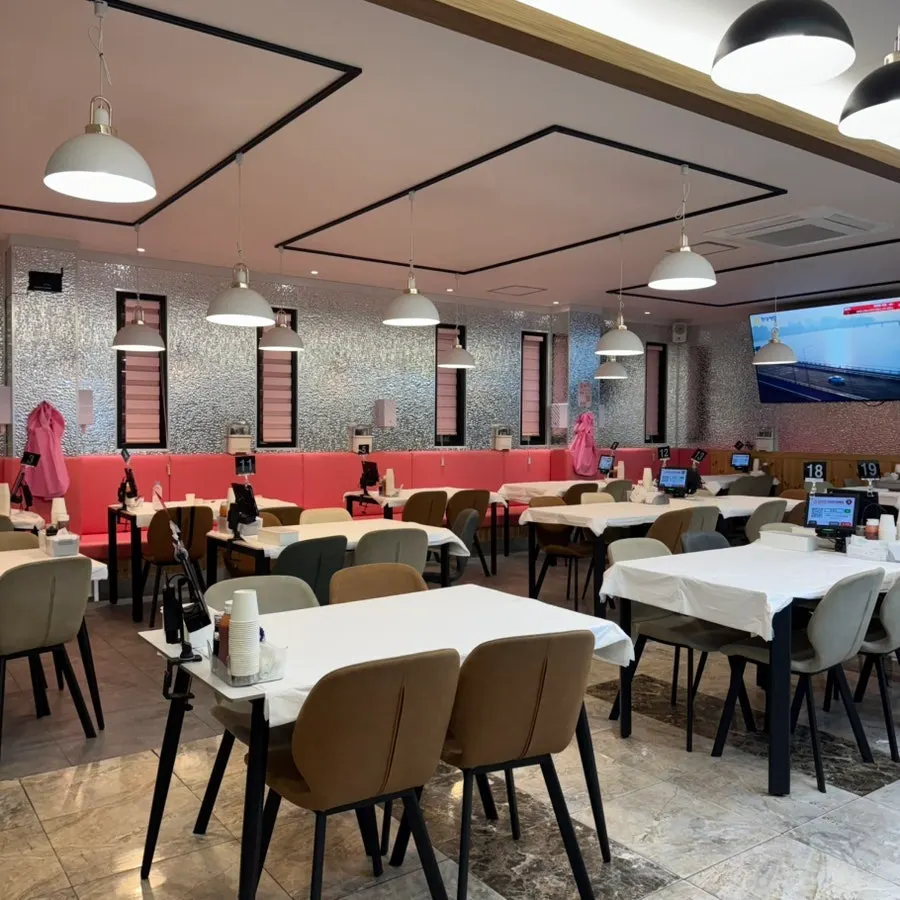 Wide hall seating inside Ppwang Mulhoe