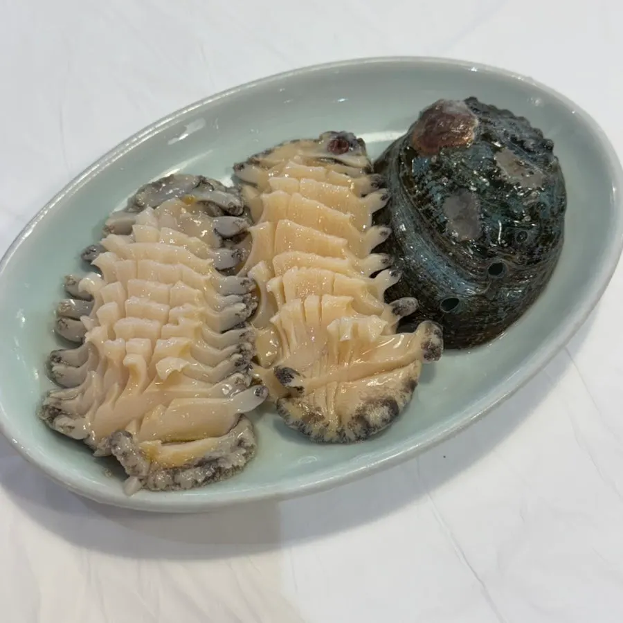 Flounder mulhoe with cheongyang chili and wasabi added