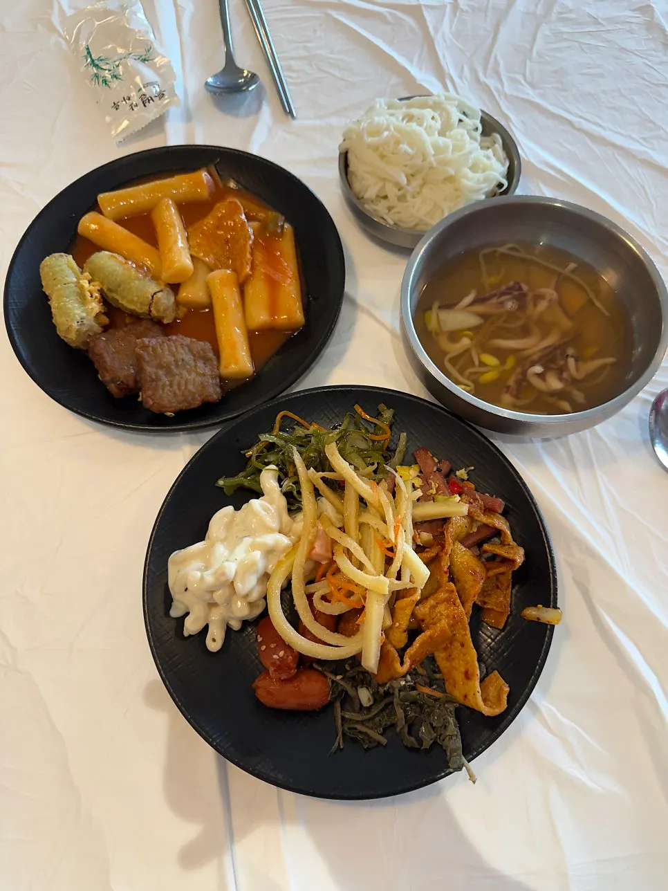 A plate of self-serve side dishes from Ppwang Mulhoe