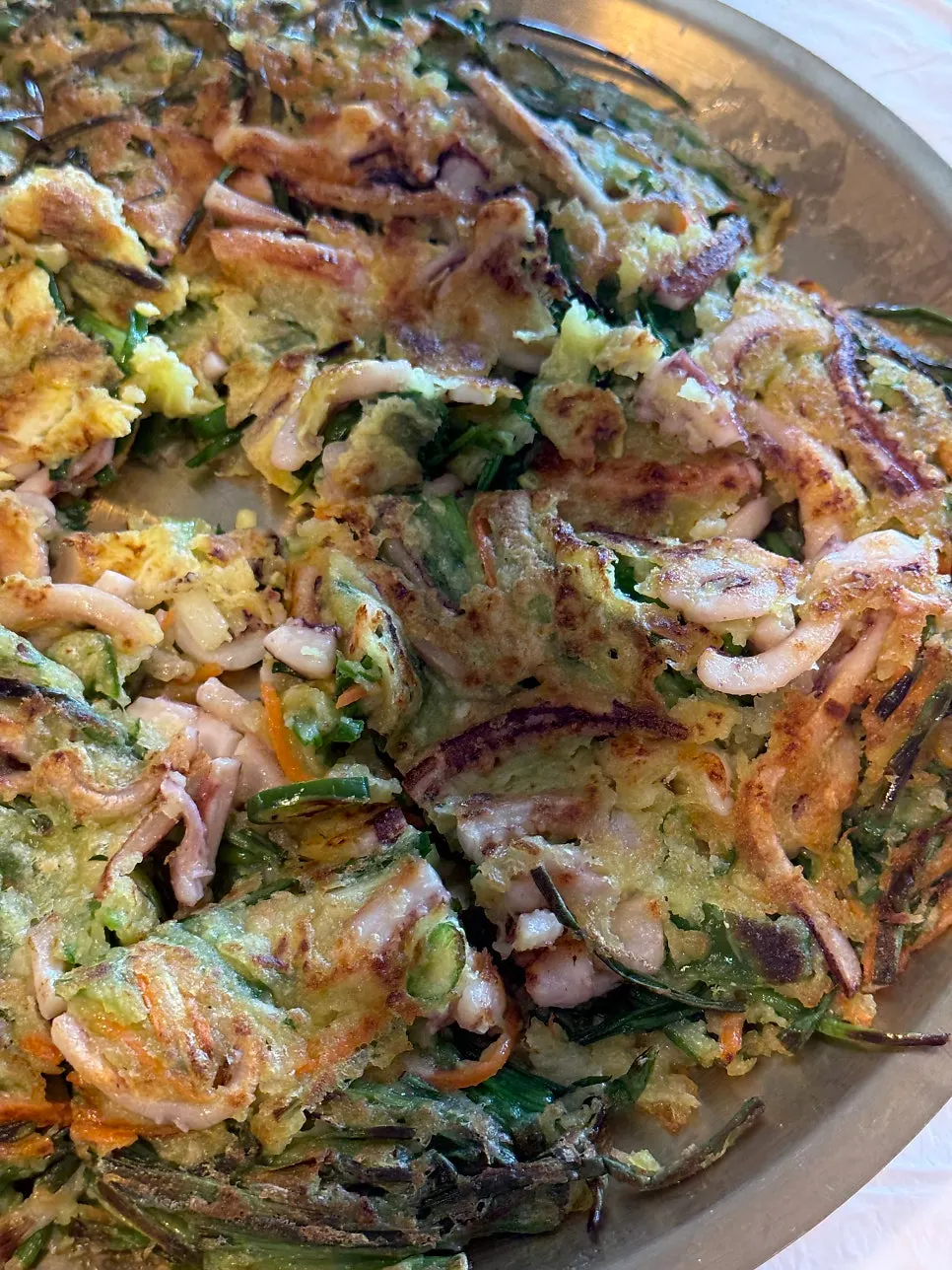 A large squid pancake packed with squid