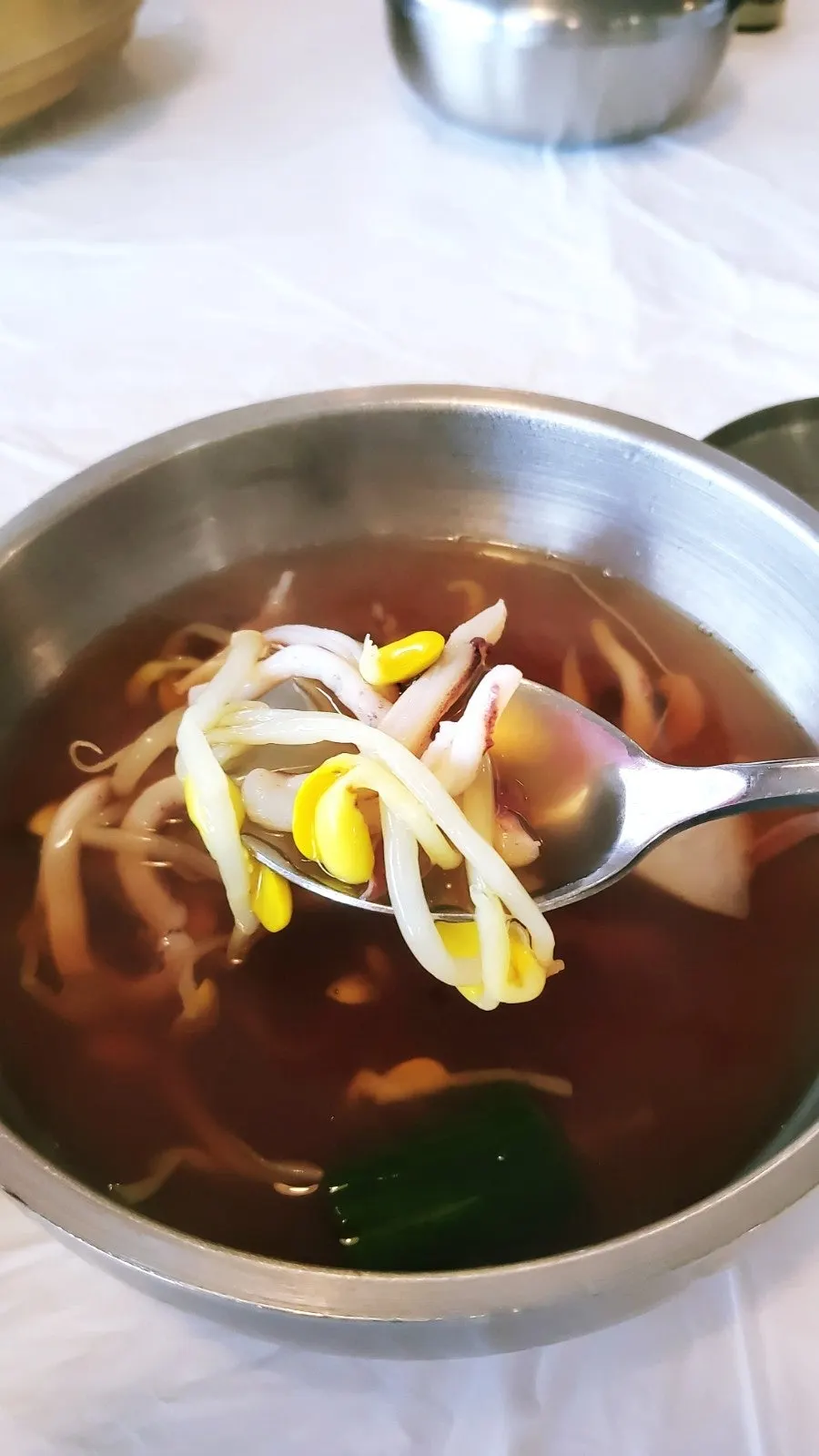 A bowl of bean sprout squid soup from the self-bar