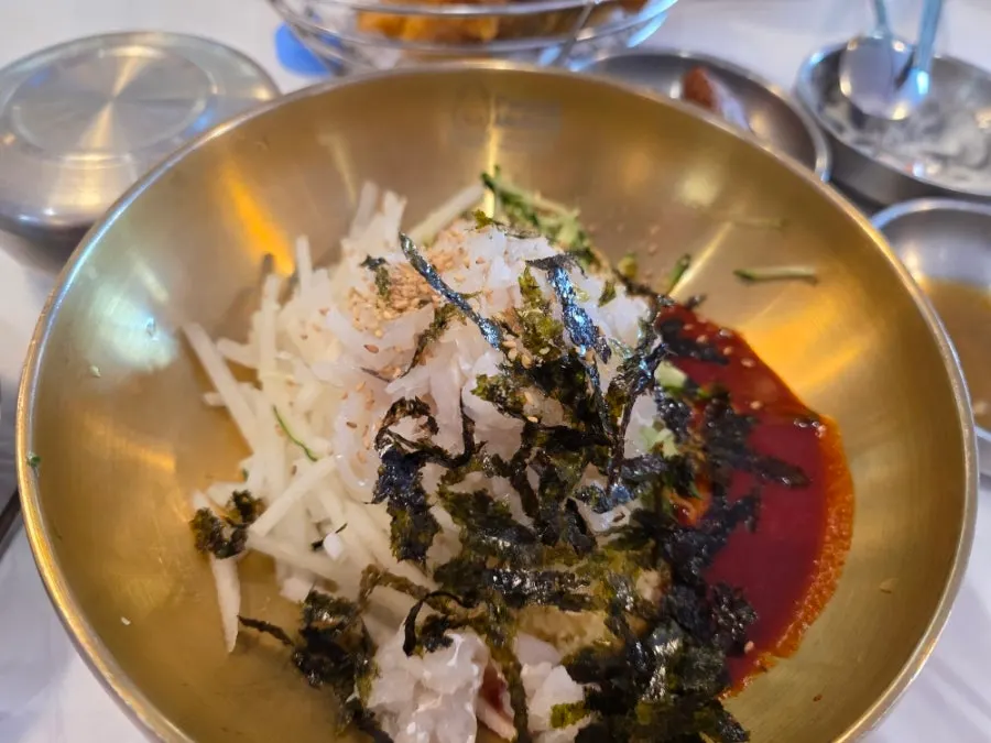 Ppwang Mulhoe's gochujang sauce with scallion, cucumber, and pear