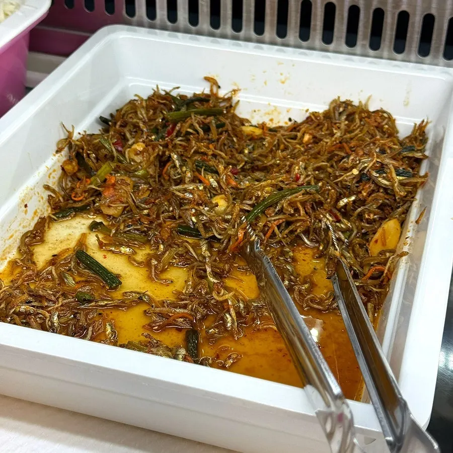 Containers of side dishes at the self-bar