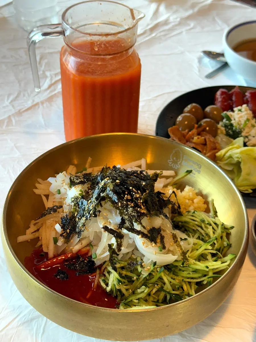 A table spread at Ppwang Mulhoe piled with side dishes