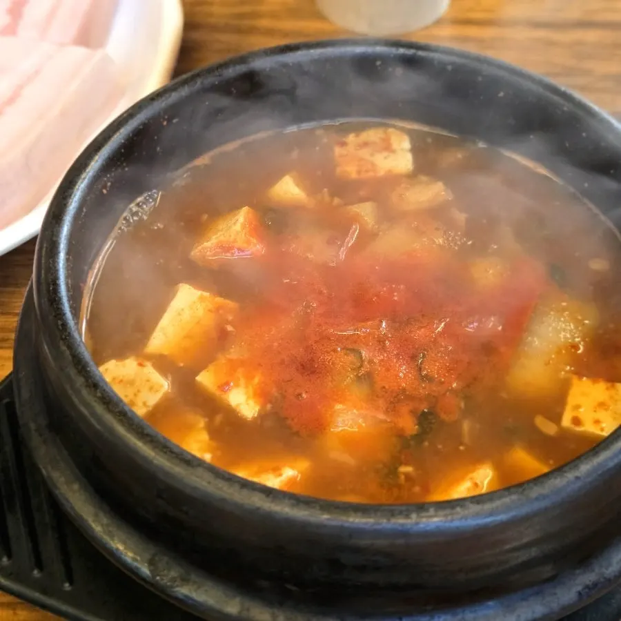 Doenjang jjigae with a whole crab inside