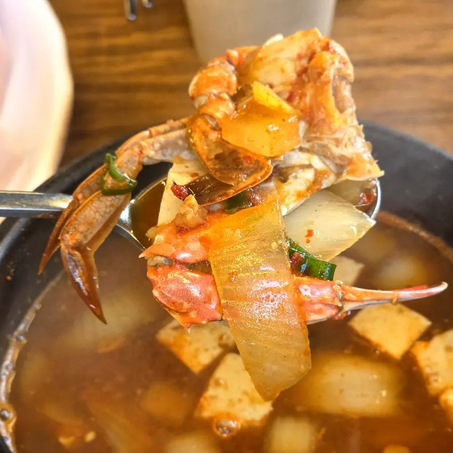 Crab doenjang jjigae broth with tofu and potato