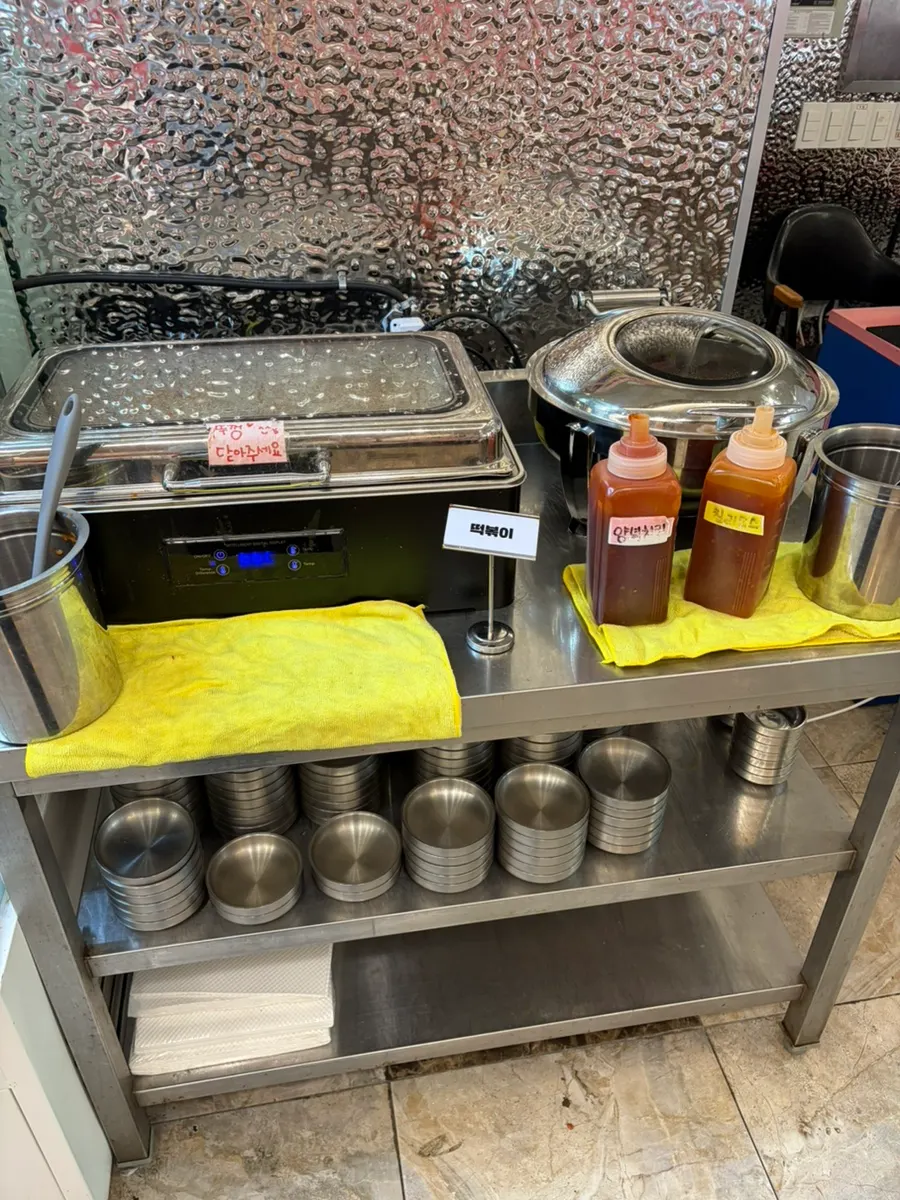 Self-serve squid soup made at the table