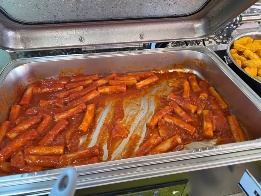 Self-bar station with tteokbokki and fried items