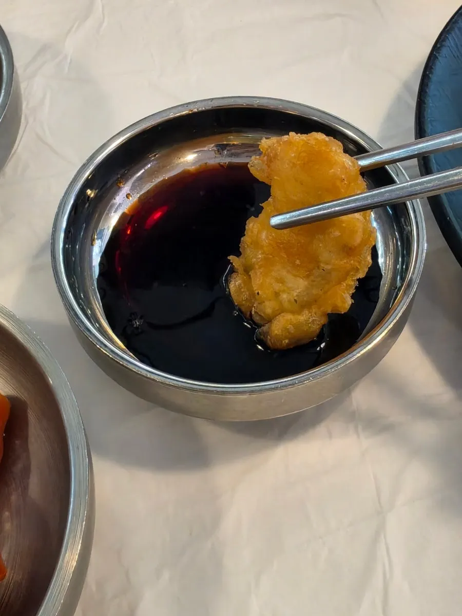 Fried squid eaten alongside the mulhoe